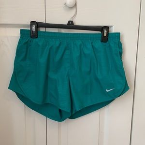 Teal blue Nike running shorts
